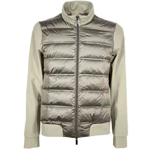 A sleek metallic silver quilted puffer vest with high collar in the RRD men green zip turtleneck jacket spring summer collection