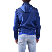 Blazer à capuche pour homme Rrd, veste zippée bleue en polyester, tissu léger et brillant, avec finitions bleues assorties aux poignets et à la taille.