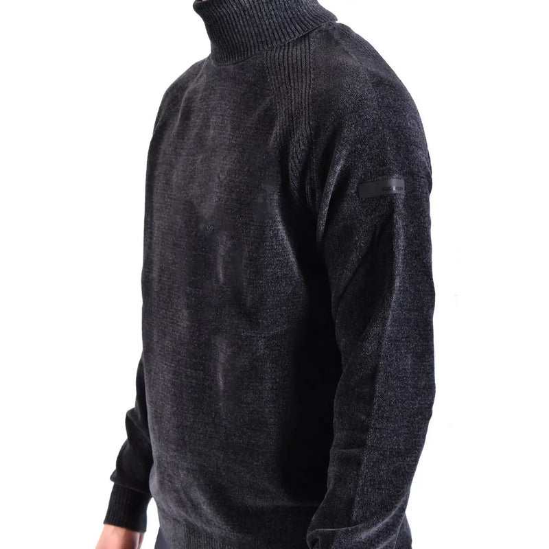 Pull à col roulé Rrd pour homme en maille texturée noire avec poignets côtelés et écusson de la marque sur la manche (vue de devant)
