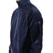 Pull à col roulé Rrd pour homme en maille côtelée bleu foncé, à tissage texturé et écusson de la marque sur la manche, vue de face