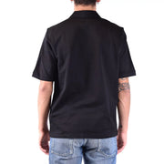 Schwarzes Baumwollpolohemd von Saint Laurent für Herren mit klassischem Kragen und sauber verarbeitetem Saum, Vorderansicht