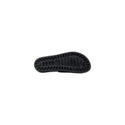 Black rubber sole of sensi men slippers la jolla urban black pvc open toe with textured grooves and embossed brand logo