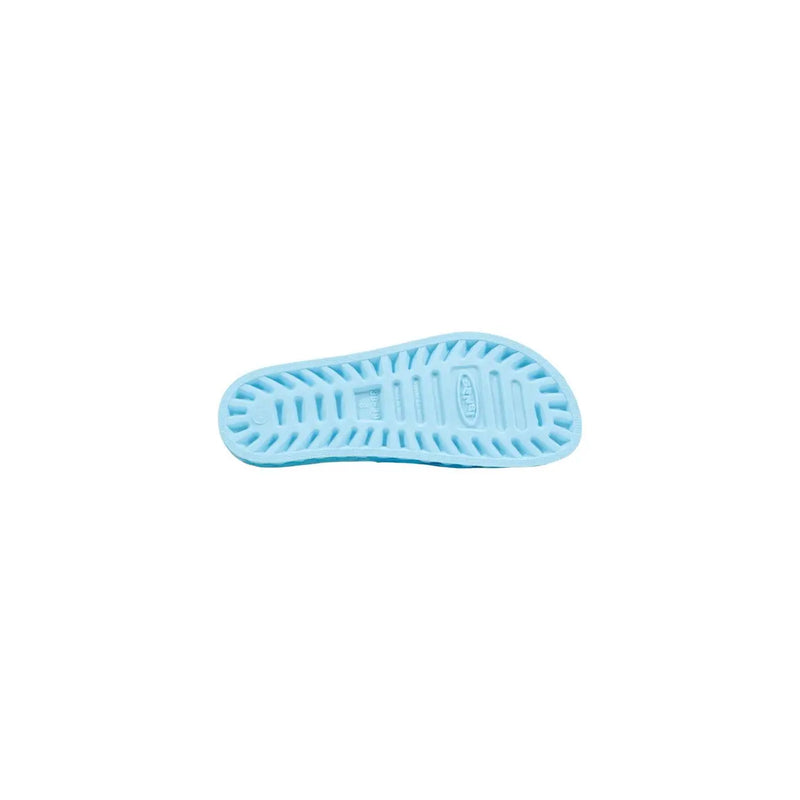 Light blue PVC sole of sensi women slippers with textured ridged pattern and embossed brand logo visible from back side