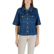 Classic blue short sleeve cotton shirt for women with chest pockets and light-colored buttons