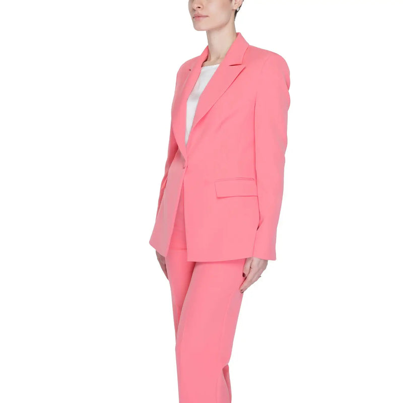 A vibrant coral pink tailored Silence Women blazer with lapel collar, front pockets, and matching modern cut trousers