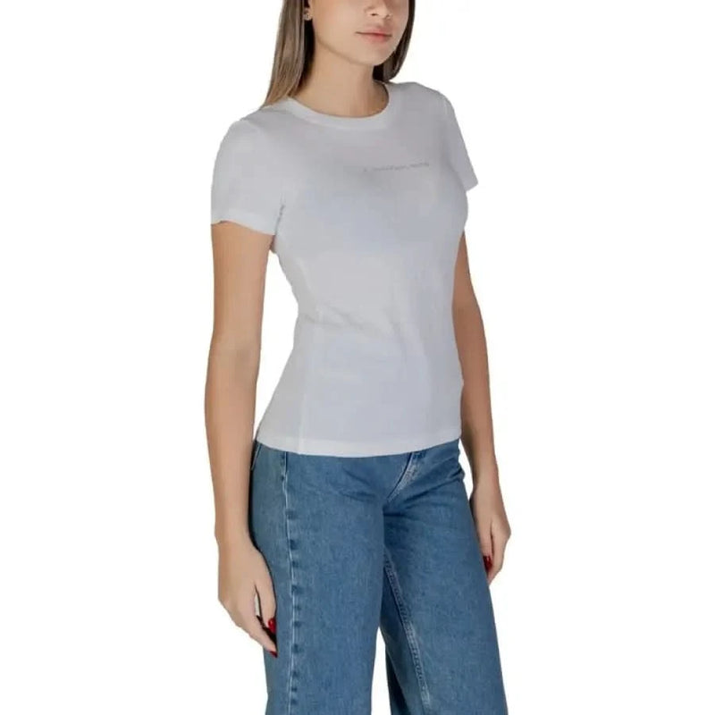 Simple white crew neck t-shirt with blue jeans from Calvin Klein Jeans for women