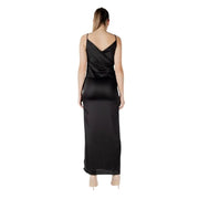 Sleeveless black satin maxi dress displayed on a mannequin for elegant evening wear