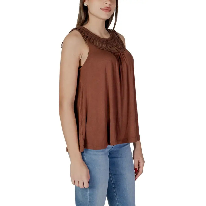 Brown viscose sleeveless tank top with textured neckline paired with light blue jeans