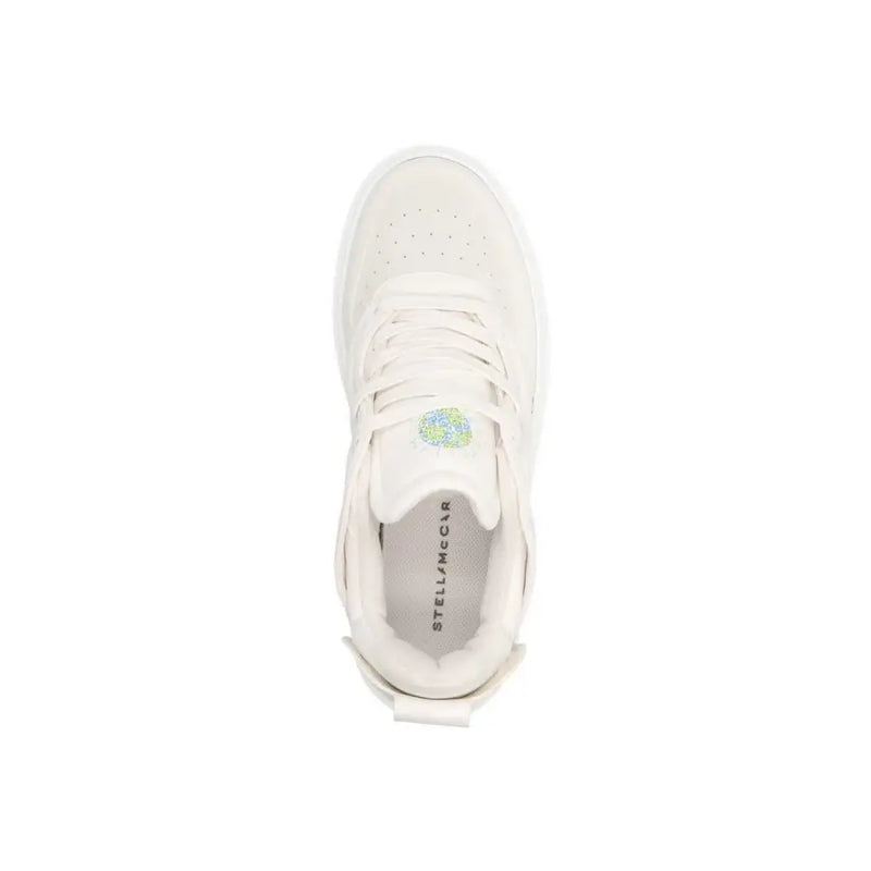 Weiße Stella McCartney Leder-Sneaker zum Hineinschlüpfen für Damen mit perforiertem Obermaterial und klobiger Sohle