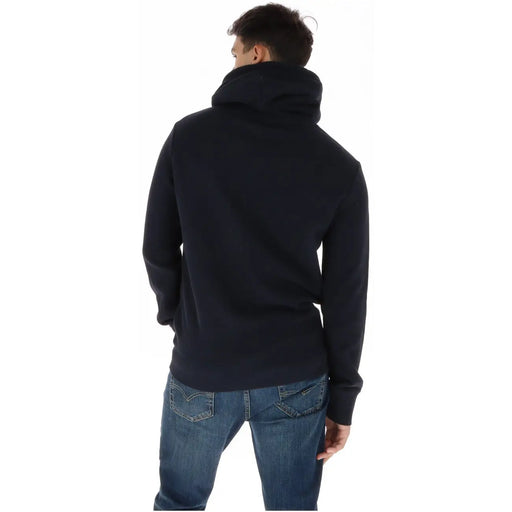 Superdry Sweat-shirt à capuche pour homme en molleton de coton bleu, doublé de noir, avec un tissu texturé doux et des poignets côtelés.