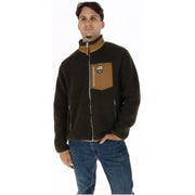 Superdry Braune Herren-Fleecejacke aus Polyester mit beiger Brusttasche und Kragenreißverschluss vorne sowie dezentem Logo auf der Tasche.
