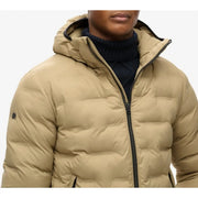 Beige quilted hooded puffer jacket with black zipper and trim made of polyester by Superdry men M5012045A