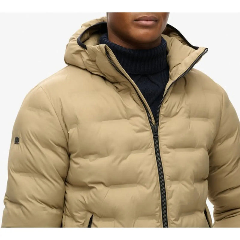 Beige quilted hooded puffer jacket with black zipper and trim made of polyester by Superdry men M5012045A