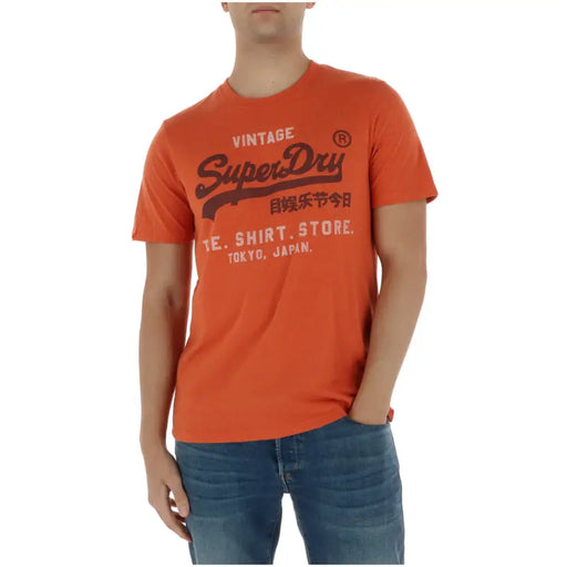 Superdry men t shirt orange cotton blend short sleeve with black vintage graphic print and te detail model M1012216A