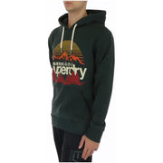 Superdry men’s green hooded sweatshirt with front pockets featuring a retro sun and mountain graphic in orange red and white