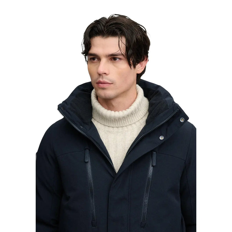 Superdry insulated winter jacket City for men in navy blue with high collar and front zipper pockets, front view