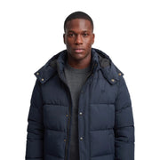 Superdry puffer jacket premium hood for men in navy blue with quilted design and silver buttons, front view