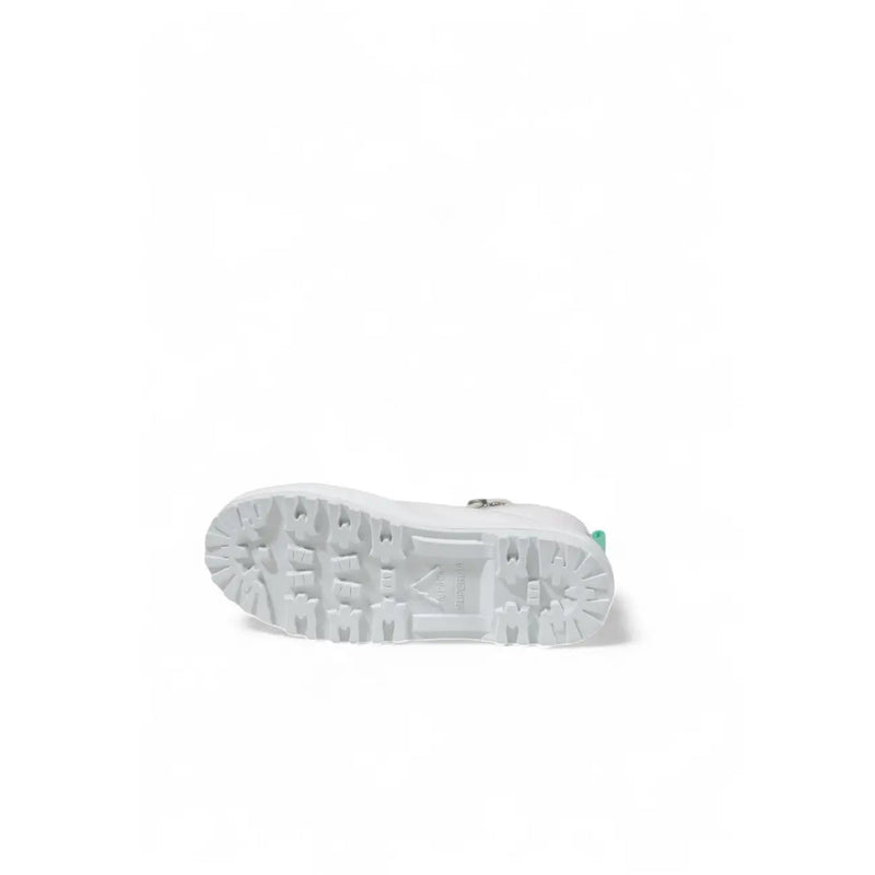 White rubber sole with textured chunky tread and subtle green accent on the heel of superga women white fabric platform sneakers