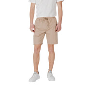 Tan drawstring shorts made of beige cotton featuring a waistband with drawstring and side pockets