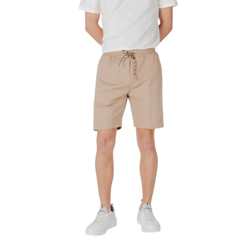 Tan Drawstring Shorts showcased in a retail display, emphasizing casual summer fashion