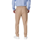 Tan striped trousers from Gianni Lupo featuring laces and pockets for men