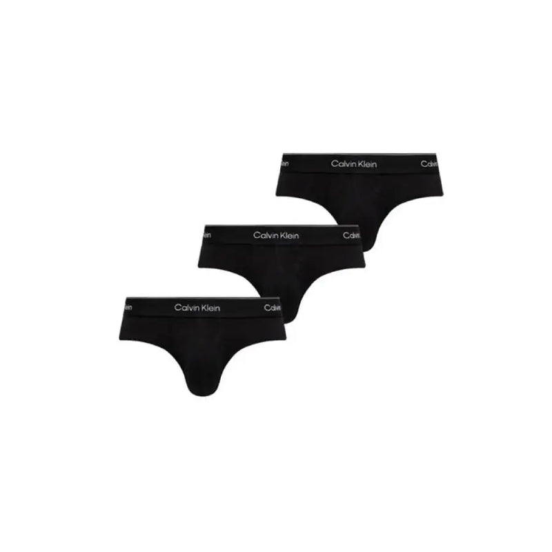 Three black Calvin Klein thongs from the Calvin Klein Thong and Brief Collection