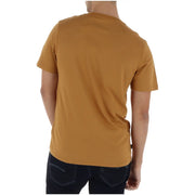 Timberland men t-shirt in mustard yellow short-sleeved crew neck style ideal for casual wear