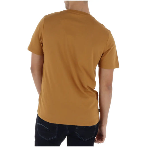 Timberland men t-shirt in mustard yellow short-sleeved crew neck style ideal for casual wear