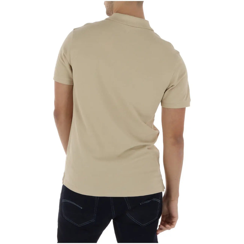 Beige Timberland men polo shirt made of cotton with short sleeves, classic collar, and neat stitching