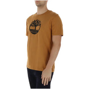 Timberland men t-shirt in mustard yellow featuring a black tree logo on the chest, casual cotton wear