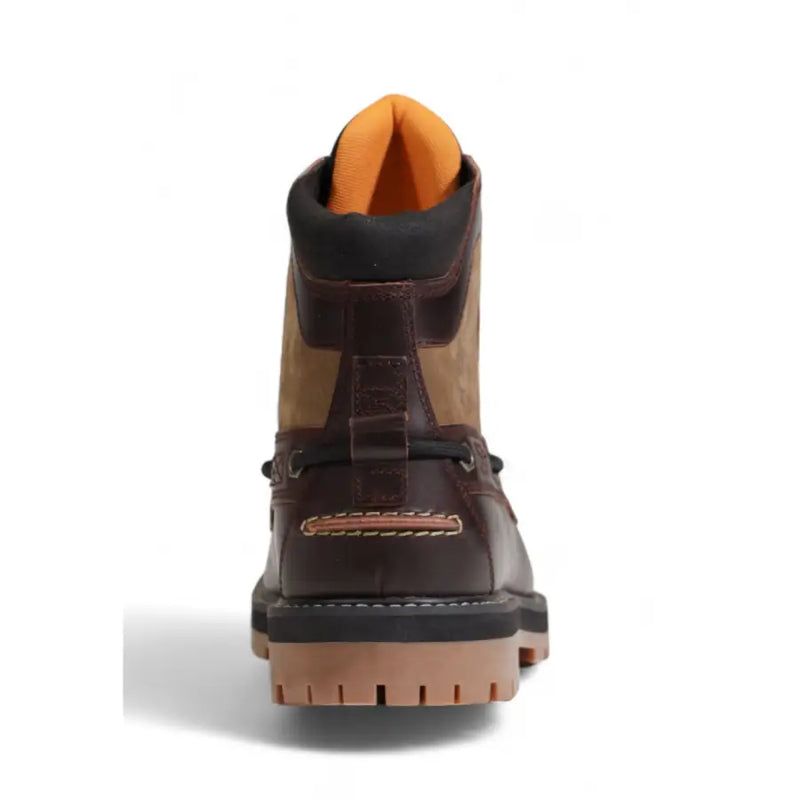 Timberland men’s brown and tan leather ankle boots with black accents orange lining and rugged rubber sole