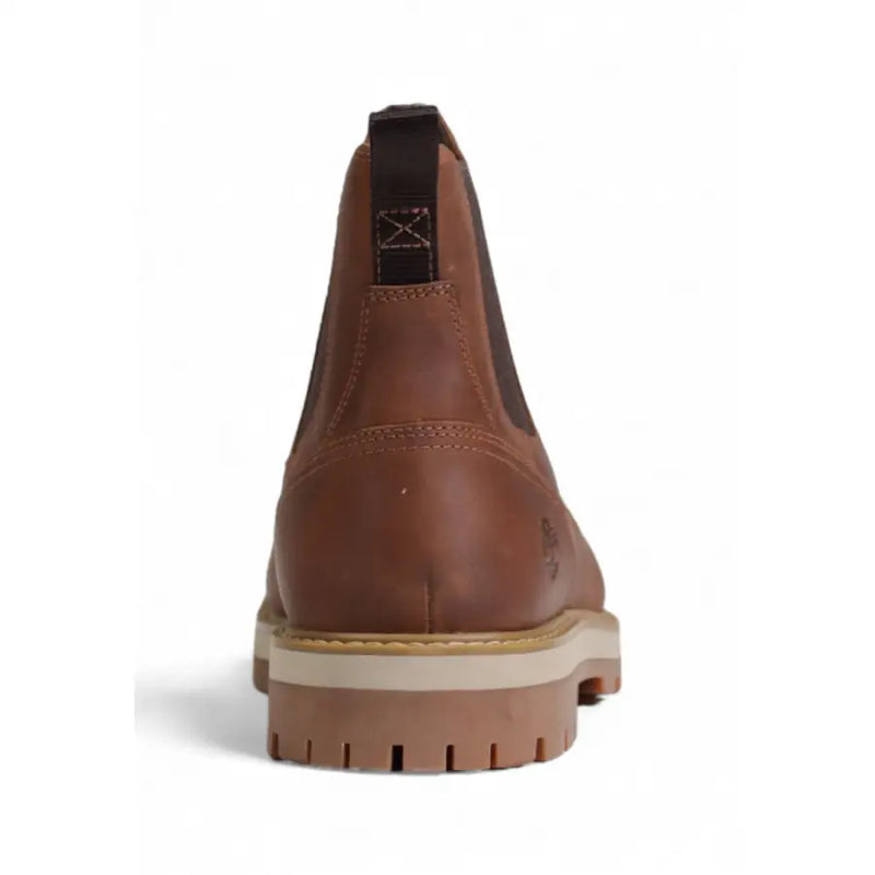Timberland mens brown leather chelsea boot with tan rubber sole and black pull tab shown from the back side