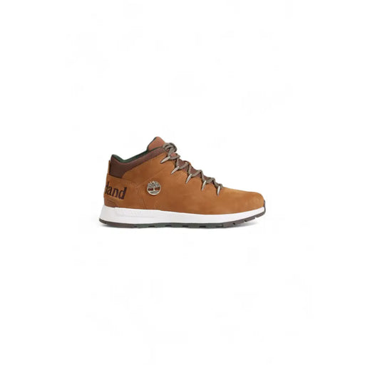 Timberland men’s brown leather high-top sneaker in tan suede with brown laces and white rubber sole for fall winter