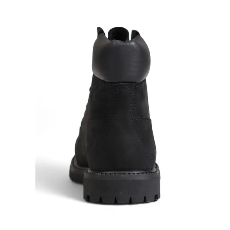 Timberland women black leather ankle boots with rugged rubber sole and stitched leather upper for fall winter use