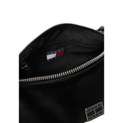 Tommy Hilfiger black faux leather handbag with silver zippers and branded patch and a zip pocket