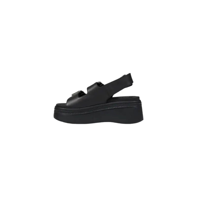 Tommy Hilfiger black leather wedge shoes for women with two adjustable straps and a thick chunky platform sole