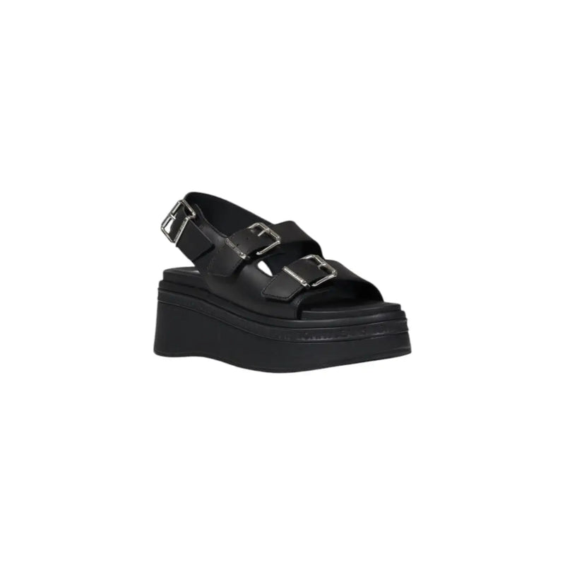 Tommy Hilfiger black leather wedge shoes for women with three silver buckle straps and thick rubber platform sole