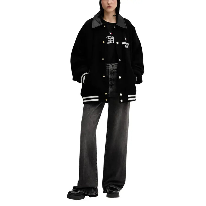 Tommy hilfiger black varsity jacket with contrasting leather collar and white striped cuffs for casual wear
