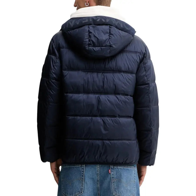 Navy blue puffer jacket with hood and sherpa lining, likely made of synthetic material for warmth.