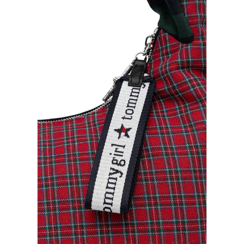 Tommy Hilfiger green checked zip handbag with red and green plaid fabric and black-and-white striped zipper pull