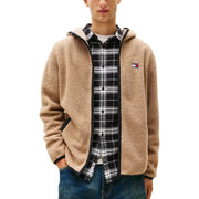 Men’s beige fleece hooded jacket with plaid shirt and dark wash jeans for casual style