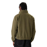Olive green carhartt jacket with high collar and elasticated cuffs shown with tommy hilfiger jeans men blazer
