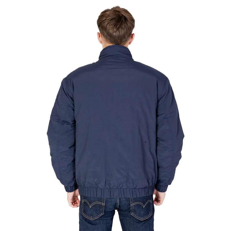 Navy blue padded nylon bomber jacket with elastic waistband and ribbed cuffs by Tommy Hilfiger Jeans men model dm0dm17238