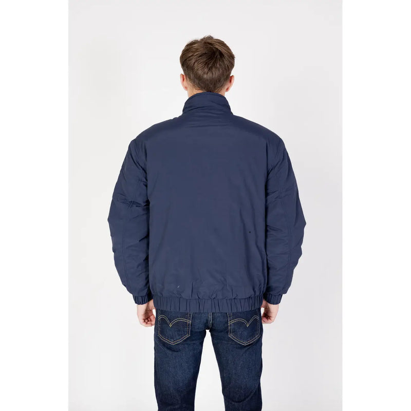 Navy blue padded nylon bomber jacket with elasticated cuffs and waistband from Tommy Hilfiger Jeans men collection