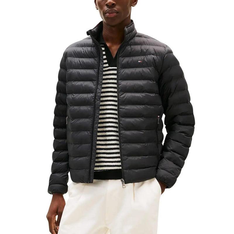 Black quilted puffer jacket with subtle Tommy Hilfiger logo on left chest from Tommy Hilfiger Jeans DM0DM20658