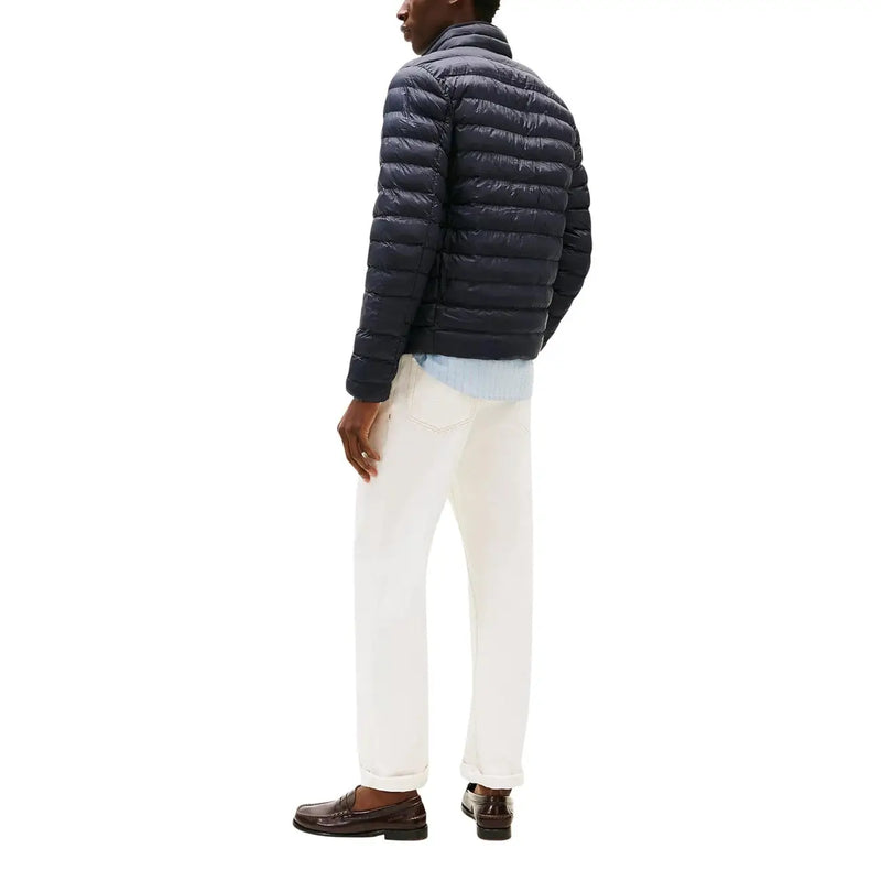 Navy blue quilted nylon zip jacket for men by Tommy Hilfiger Jeans model DM0DM20658 shown from the front