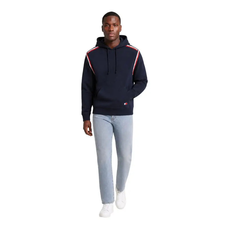 Navy blue Tommy Hilfiger Jeans men hoodie with red and white striped shoulder panels made from organic cotton