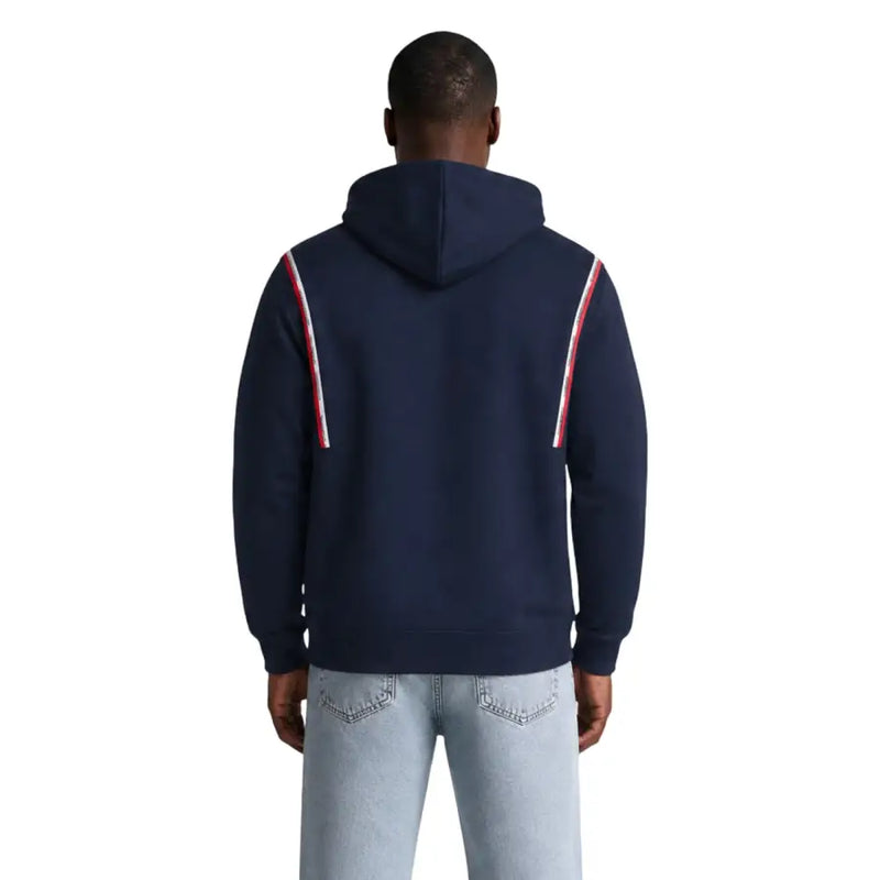Tommy Hilfiger Jeans men blue organic cotton hoodie with navy blue body and red and white striped sleeve panels