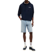 Navy blue tommy hilfiger jeans men sweatshirt made of organic cotton with a small embroidered logo on the chest