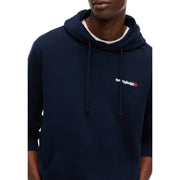Navy blue tommy hilfiger jeans men hoodie with white and red logo chest made from organic cotton sweatshirt